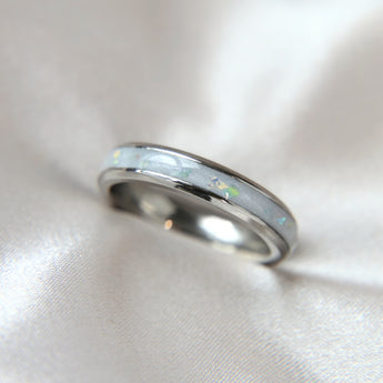 Breastmilk, pearl white shimmer and opalescent fleck, titanium band 