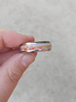 Bereaved fathers breastmilk ring with red flecks and hair
